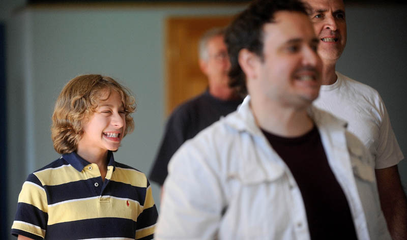 Gabriel Lessing, 13, practices with some voice exercises during auditions for "Fiddler on the Roof," at the Waterville Opera House dance studio on Main Street in Waterville today.