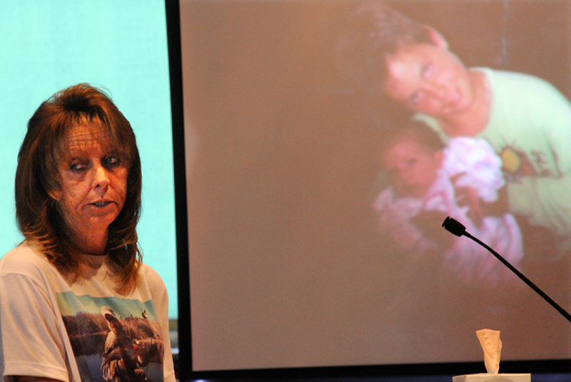 Brenda Smith addresses Matthew Partridge Wednesday morning as he is sentenced for the shooting death of Smith's son, Justin. A slideshow of Justin V. Smith's life played behind his mother at Kennebec County Superior Court in Augusta as she described the impact his death had upon her family.