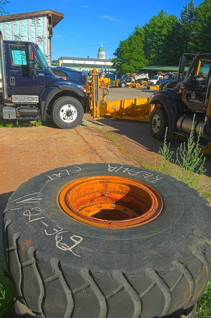 This photo taken on Wednesday shows the State House dome behind the the Maine Department of Transportation Fleet Services building on Capitol Street in Augusta.