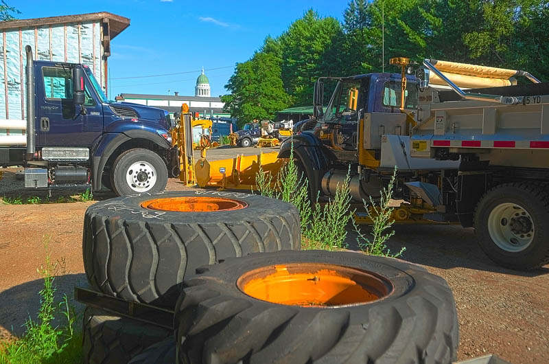 This photo taken on Wednesday shows the State House dome behind the the Maine Department of Transportation Fleet Services building on Capitol Street in Augusta.