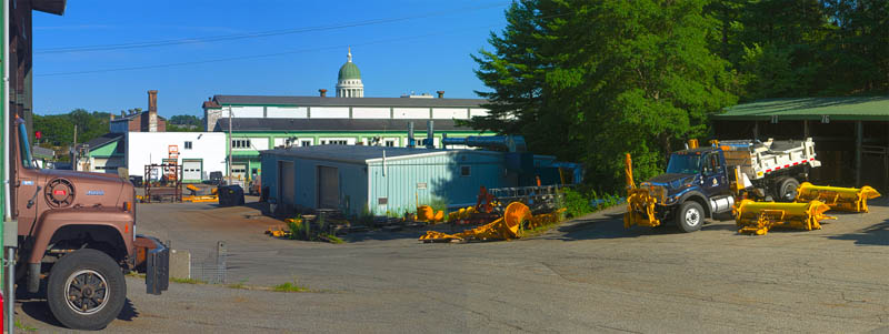 This photo taken on Wednesday shows the State House dome behind the the Maine Department of Transportation Fleet Services building on Capitol Street in Augusta.
