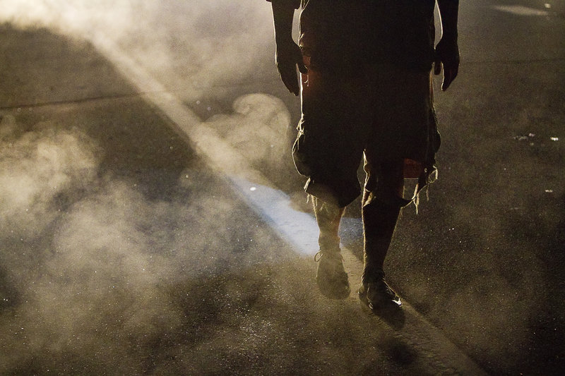 A motorist walks a line while being assessed for sobriety at a checkpoint set up Friday on Route 1 in Brunswick by Cumberland County police assigned to the Regional Impaired Driving Enforcement, or RIDE, team. Maine records going back to 1982 show that nearly 15,000 people have at least three prior cases of operating under the influence.