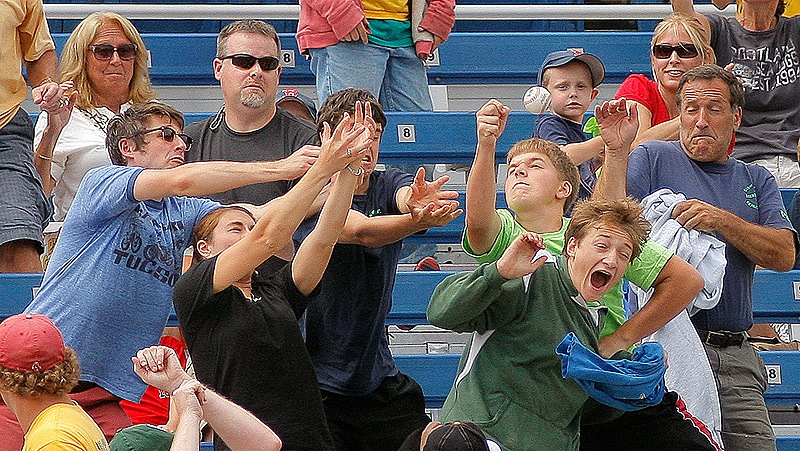 It was time for lunging, cringing and plain old hoping Thursday as a foul ball found its way into the seats at Hadlock Field. No matter where the ball ended up, one thing was sure: The moment would be remembered and cherished far longer than the score of the game.