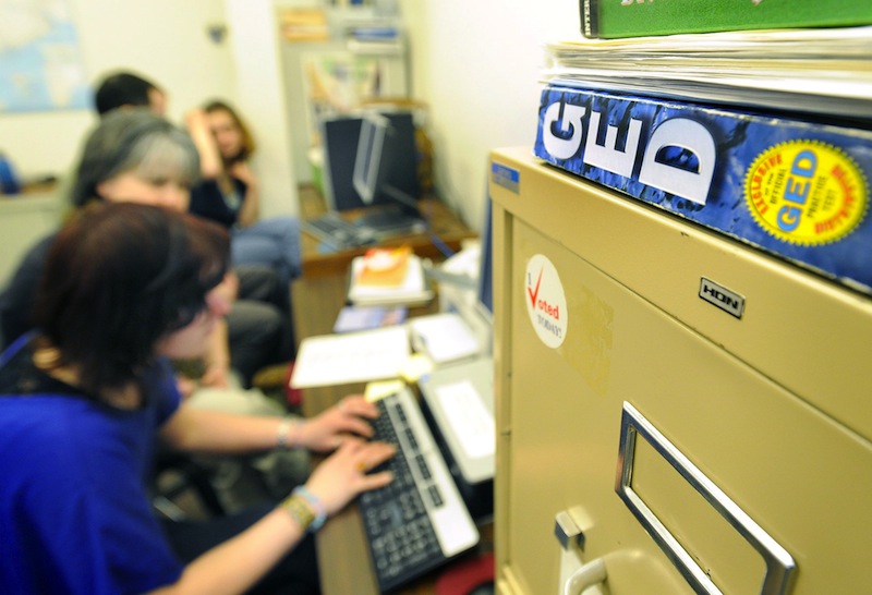 In this September 2011 file photo, Portland's Street Academy teachers work with homeless kids to get their GEDs. aine education officials are dropping the long-running General Educational Development high school equivalency test – which will switch to an electronic-only format in January – for another test that can be taken on paper or on a computer.