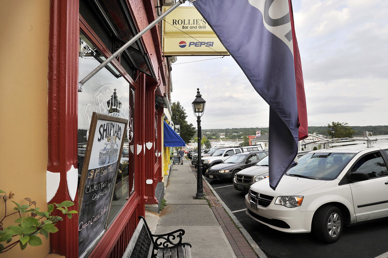 Rollies Bar and Grill near the waterfront in Belfast was a place shooting victim Mathew Day, 22, frequented. His mother Lynn Arsenault, 55, died in the incident, and it remains the talk of the town.