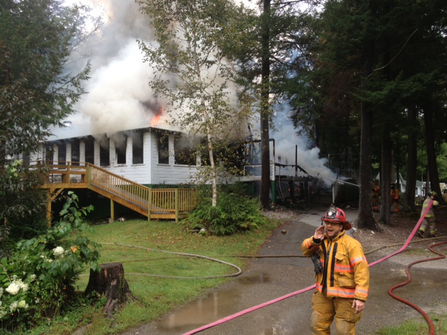 The lodge at Echo Lake camp in Fayette was fully engulfed upon the arrival of firefighters, according to Readfield Fire Chief Lee Mank.