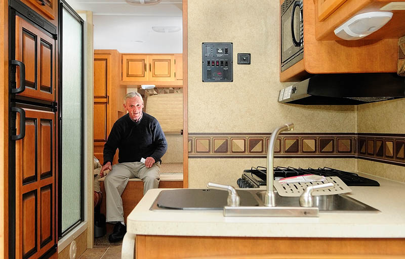 Chris Harnish talks about his 30-foot motor home during an interview Thursday in Augusta. He plans to leave the city in the RV on Oct. 10, on a five-month journey south and west to find the perfect retirement location.
