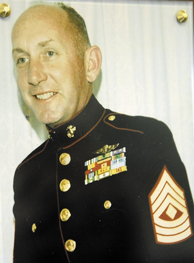 A plaque honoring Winthrop native Marine Corps First Sgt. Don "Woody" Hamblen was hung on Thursday at the Winthrop Town Office.