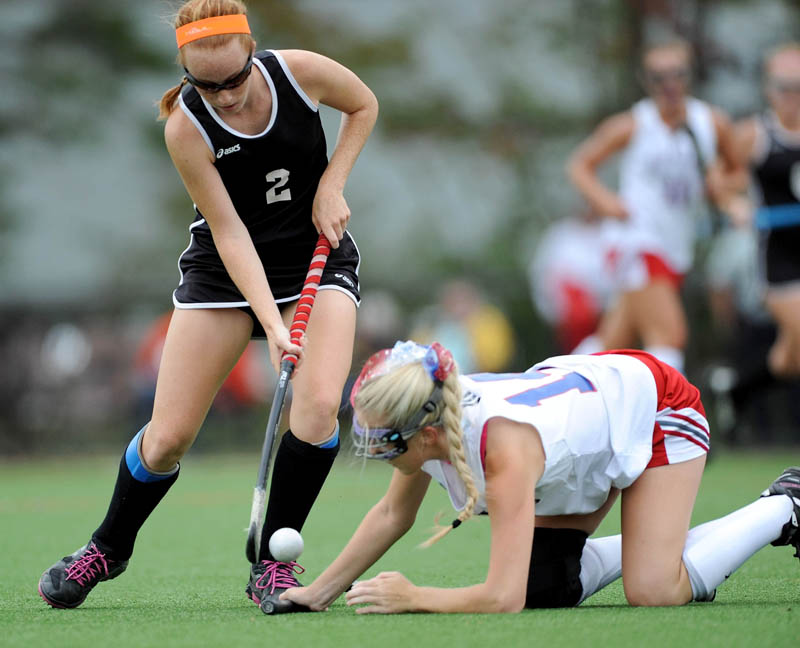 ON THE MOVE: Skowhegan Area High School’s Renee Wright, left, tries to pass Messalonskee High School’s Kate Levesque during the first half of the Indians’ 2-1 win over the Eagles on Tuesday in Waterville.
