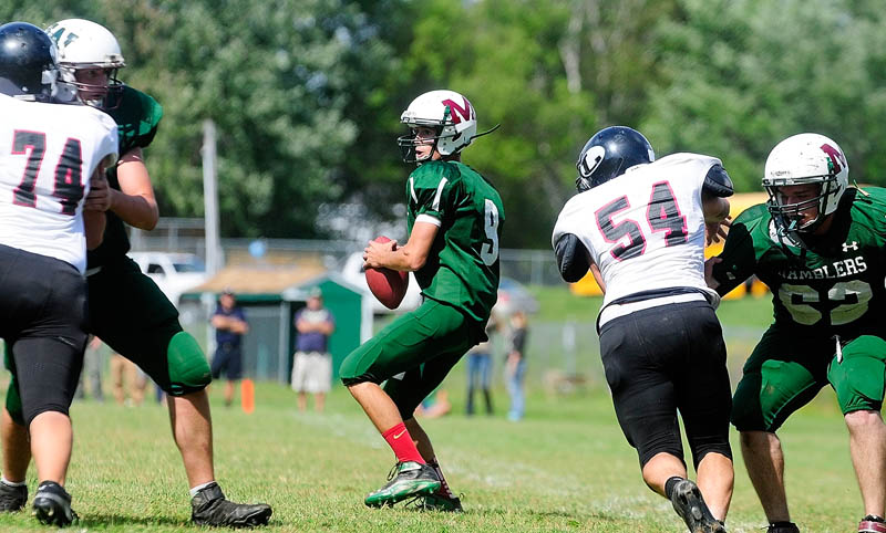 Winthrop quarterback Jared Hanson drops back to throw during a game on Saturday at Maxwell Field in Winthrop.