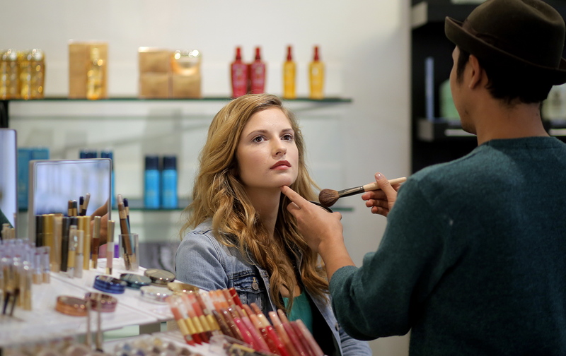 Beauty-pageant contestant Tara Cavanagh of Portland works with editorial stylist Peter-John Ulloa at Akari Salon on Tuesday. Cavanaugh is using crowd-funding to pay for her Miss Maine campaign.
