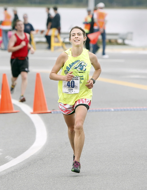 Woman’s marathon winner Leah Frost of Round Pound approaches the finish line Sunday in Portland.