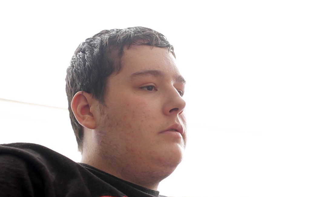 James Reynolds, 18, is still recovering from gunshot wounds to the head, arm and leg stemming from an armed confrontation with a Maine State Police trooper in June.