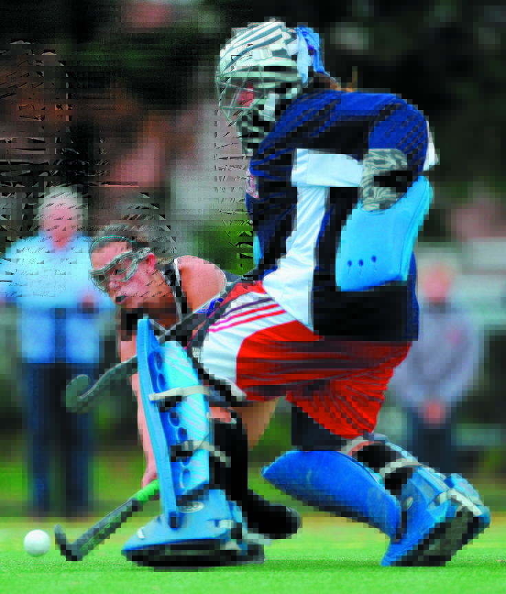 WE MEET AGAIN: Messalonskee goalie Abby Roberts, right, tries to block a shot by Skowhegan’s Brooke Michonski during a game earlier this season. The Eagles and Indias face off in the Eastern A final for the sixth straight season.