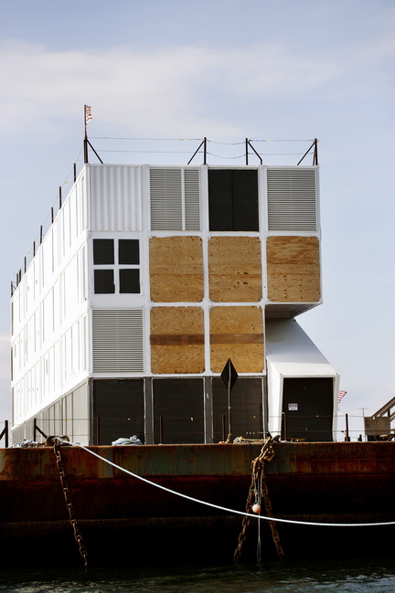 The barge holding a four-story structure made of shipping containers sits Monday in Portland Harbor. There are signs it may be a floating data center for Internet giant Google.