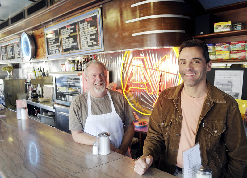 A1 Diner owners Mike Giberson, left, and Neil Anderson are celebrating the 25th anniversary of the Gardiner landmark. The men took a break from preparing food Wednesday to discuss their restaurant.