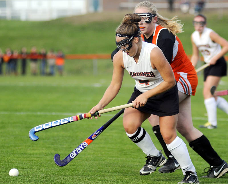 GOING TO THE NET: Gardiner’s Nicole Chadwick chases the ball as Brewer’s Keanna Beal tries to catch up during Wednesday’s Eastern Class B quarterfinal in Gardiner.