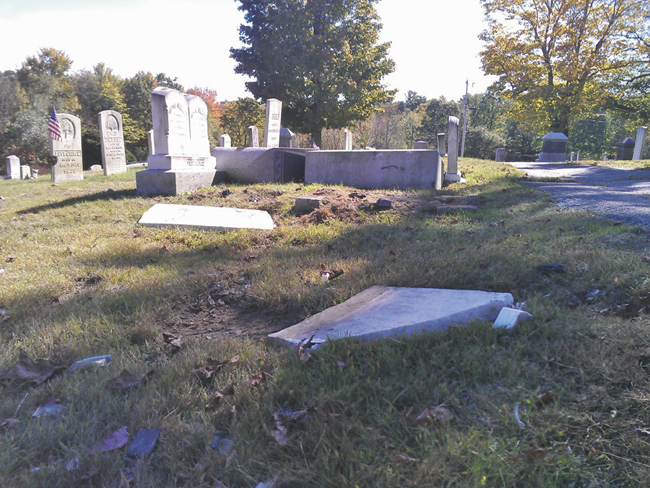 Police say Melissa Grant, 42, and Savannah Lowe, 20, both of Winthrop, caused an estimated $35,000 of damage to headstones in Monmouth Ridge Cemetery on Friday.