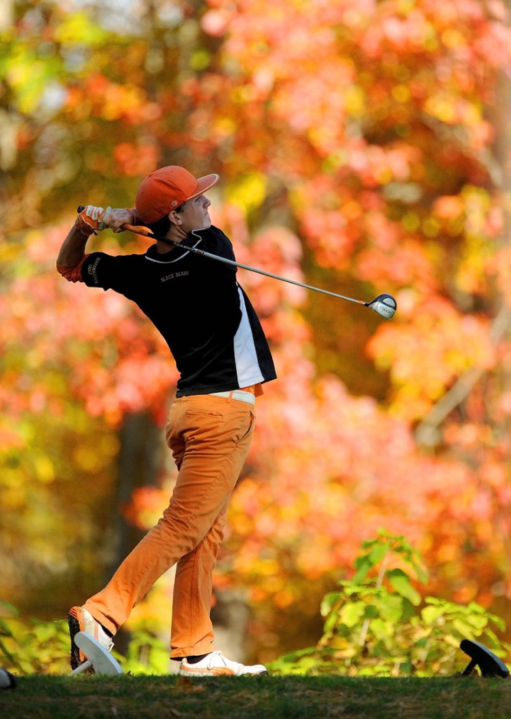 TIME TO WIN: Maranacook High School’s Luke Ruffing tees off on the 18th hole during the individual golf state championships Saturday at Natanis Golf Course in Vassalboro. Ruffing shot 71 to win the Class B title.
