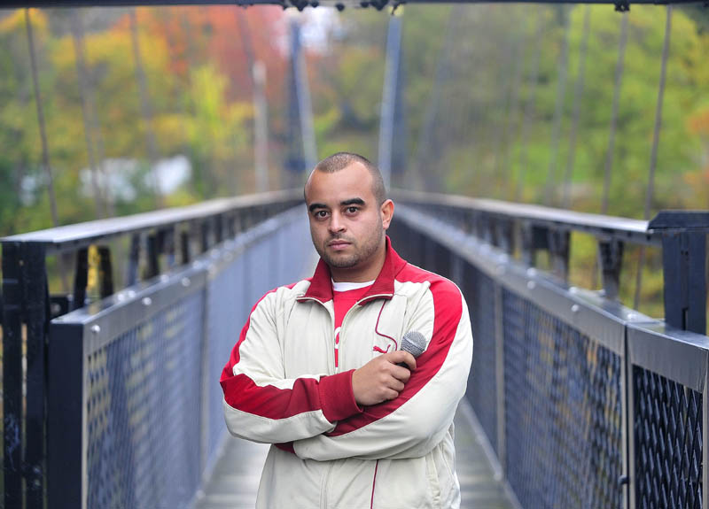 Jason Lopez, know as Flowpez, co-event organizer, performed at the first Kennebec Rap N Rock Music Festival at the Head of Falls today. The proceeds from the show will go to the Domestic Violence Alliance, Student Athletes' Anti-bullying Community and the Waterville Humane Society.
