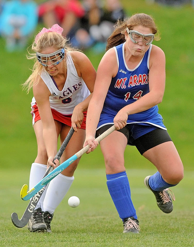PLAYOFFS UNDERWAY: Messalonskee’s Kassi Michaud, left, and Mt. Ararat High’s Samantha Hamilton battle for the ball during Messalonskee’s 4-1 on Wednesday in Oakland.
