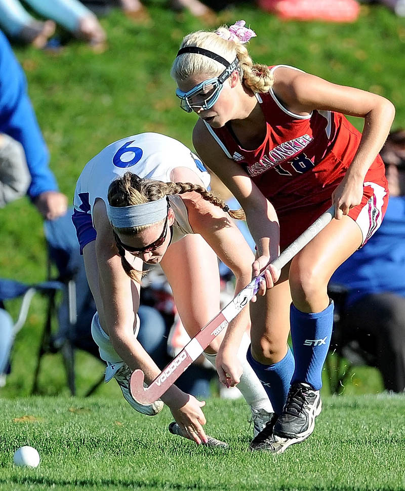 ALL-OUT EFFORT: Lawrence’s Lilla Tilton-Flood, left, battles for the ball with Messalonskee’s Nathalie St. Pierre during the Eagles’ 4-0 win Tuesday at Lawrence High School in Fairfield.