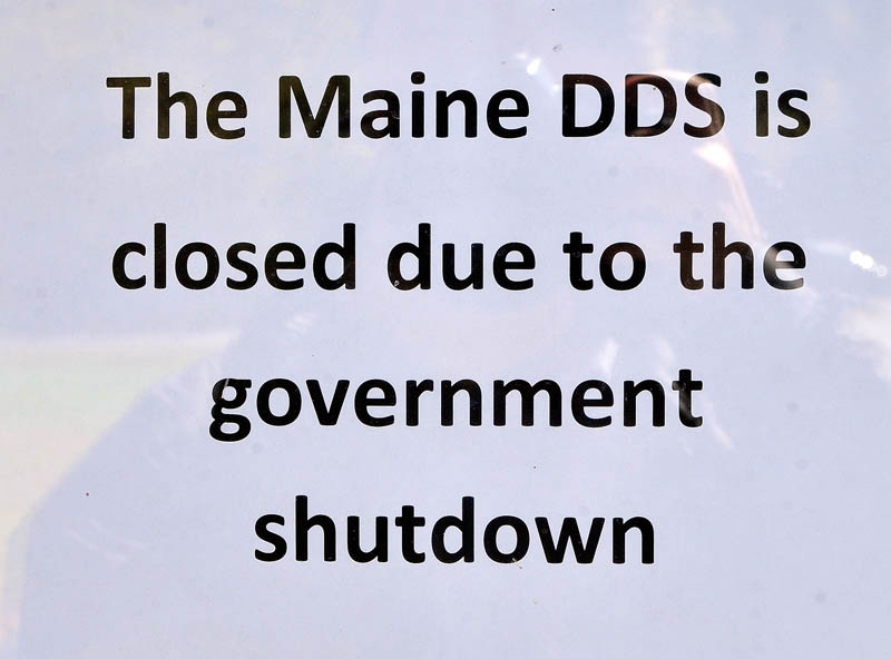 This sign in the window announces that Department of Health and Human Services Disability Determination Services office is closed due to federal government shutdown.