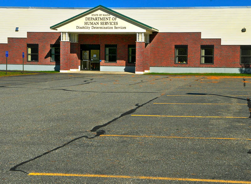 The parking lot in front of the closed Department of Health and Human Services Disability Determination Services office was empty on Tuesday in Winthrop.