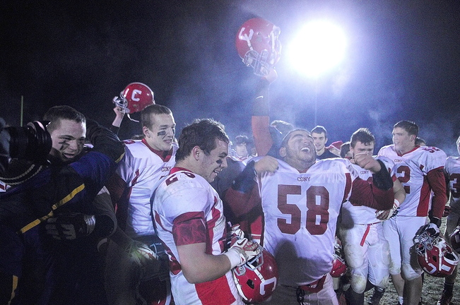 Staff photo by Joe Phelan Cony Rams celebrate after winning Pine Tree Conference class B championship on Friday November 15, 2013 in Brunswick.