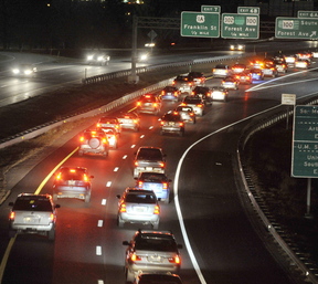 Northbound traffic on I-295 backs up as it nears an accident scene between the Forest Avenue exit and the Franklin Arterial exit Tuesday.
