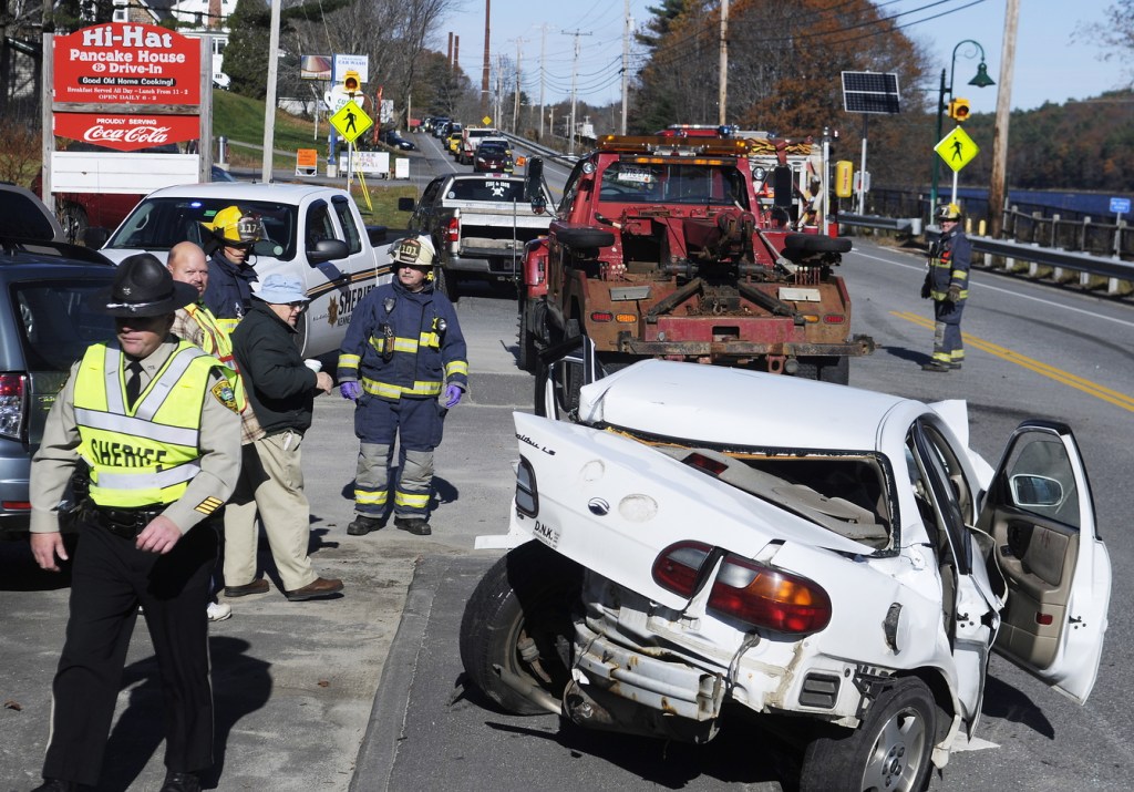 Staff photo by Andy Molloy TIE UP: Three people were injured Sunday morning just after 10 a.m. on U.S. Route 201 in Farmingdale following a three car collision, according to police. A southbound Jeep crossed the center line, striking a northbound Subaru station wagon that was pushed into a Chevy Malibu, according to Kennebec County Deputy Sheriff Galen Estes. Patients were taken to MaineGeneral in Augusta and Central Maine Medical Center in Lewiston, firefighters said. The accident that reduced traffic to a single lane for more than an hour remains under investigation, Estes said.