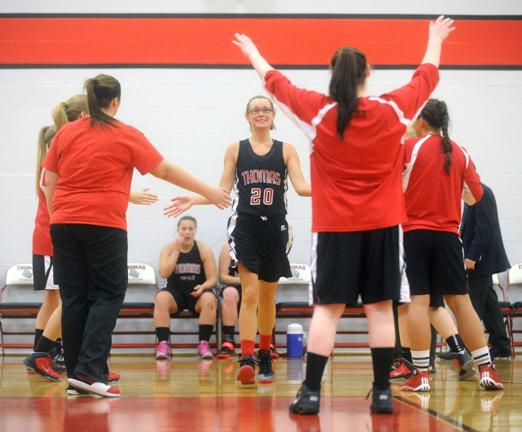 Staff photo by Michael G. Seamans COLLEGE BASKETBALL: Emily Reynolds is announced in pre-game against Johnson State at Thomas College in Waterville on Saturday, Dec. 7, 2013.