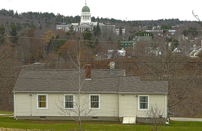Housing proposal: This photo taken in NOvember on Arsenal Heights in Augusta shows one of the four former group homes that once again could become temporary housing for those who no longer need the level of care provided at RIverview Psychiatric Center.