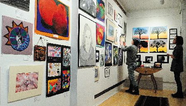 Teen talent: Monmouth Academy students Kayla Frost, left, and Sara Caruso participate in an art show with work by students from eight area high schools in March at The Harlow Gallery in Hallowell.