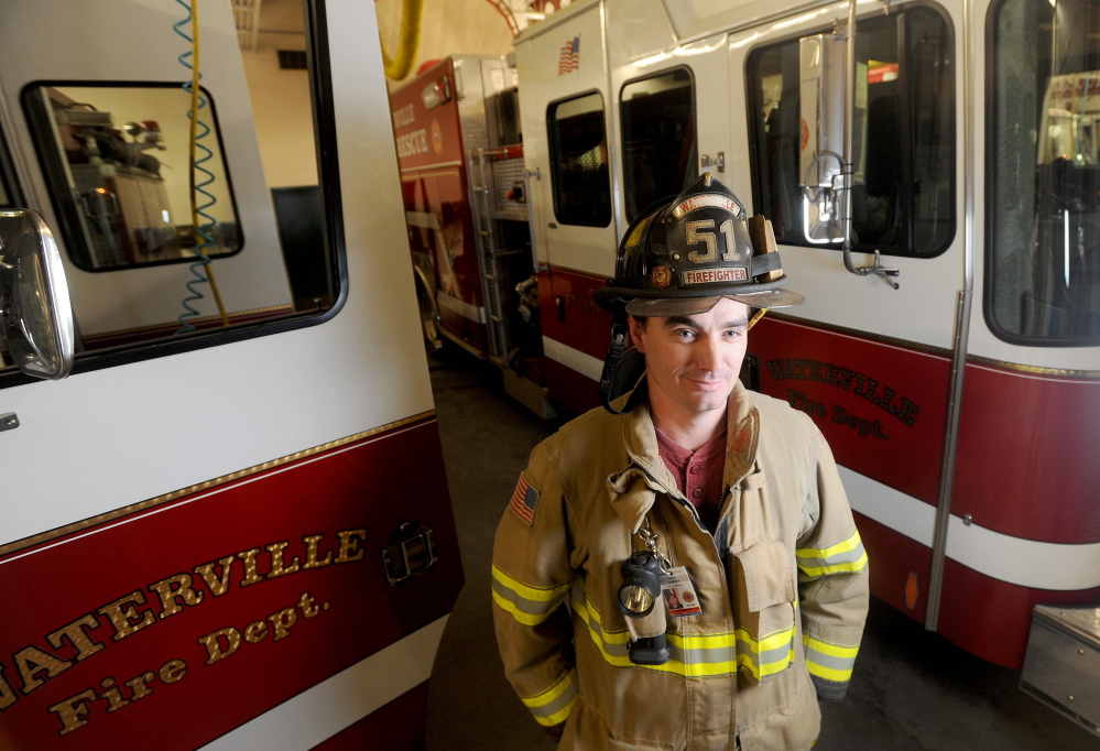 Staff photo by Michael G. Seamans FIRE RESCUE: Mark Hamilton, a reuse technician with the Waterville fire department is being credited with rescuing a man from the basement of an apartment building fire on Mount Pleasant Street in Waterville on Wednesday night.