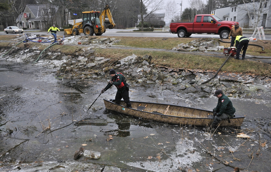 Staff photo by Michael G. Seamans Game Wardens search a small pond on First Rangeway on Wednesday for 20 month old Ayla Reynolds who was last seen in bed Friday night only blocks away.