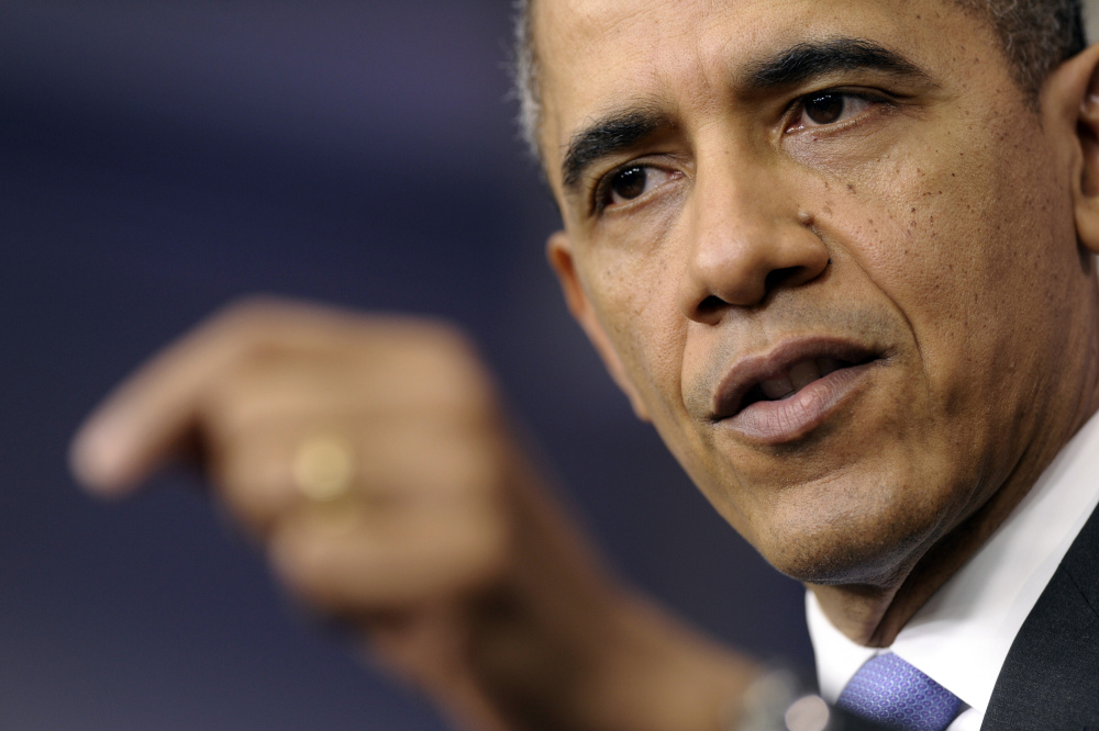 President Barack Obama speaks during an end-of-the year news conference at the White House Friday. At the end of his fifth year in office, Obama’s job approval and personal favorability ratings have fallen to around the lowest point of his presidency. Obama will depart later for his home state of Hawaii for his annual Christmas vacation trip. It’s the first time in his presidency that his departure plans have not been delayed by legislative action in Washington.