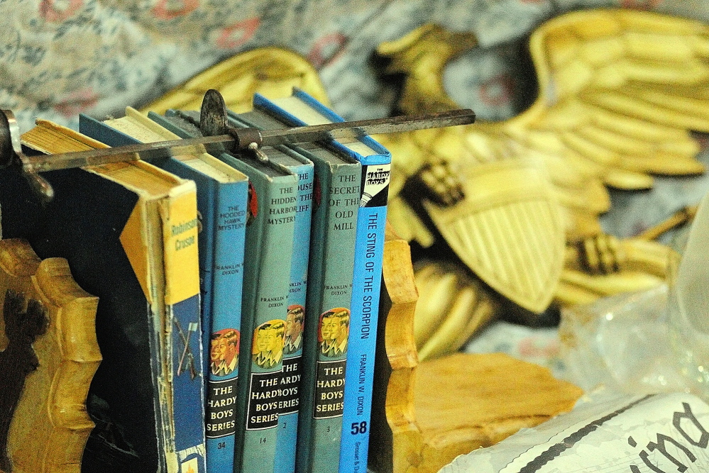BOOK VALUE: These Hardy Boys books were among the items on sale Wednesday during the New Year’s Antiques Show at the Augusta State Armory.