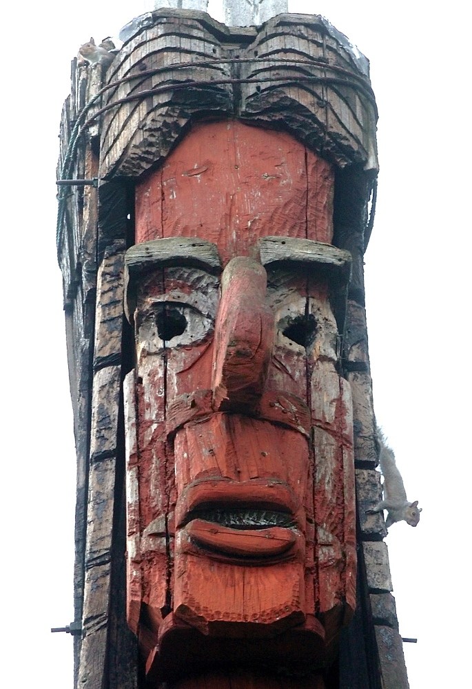 NUTS: A gray squirrel runs down the face of the Skowhegan Indian sculpture in an undated file photo. At least four squirrels ran in and out of holes in the tall sculpture at the time.