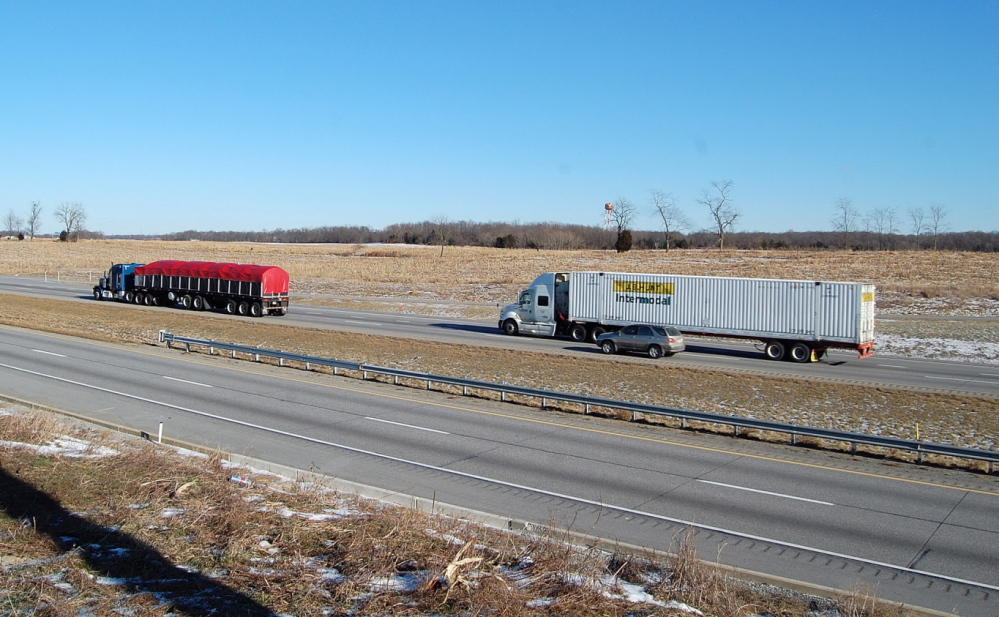 On Tuesday, Jan. 7, 2014, northbound vehicles on Interstate 81 pass the site in the median where Timothy "Atsi" Davison of Poland, Maine, was shot to death in a random act of violence early Saturday, Jan. 4, in south-central Pennsylvania near the Maryland state line. Davison had called 911 in Maryland and again when he crossed into Pennsylvania to say that he was being pursued and shot at by someone in a small, dark-colored pickup truck. Davison was on his way home from visiting his sister in Orlando, Fla., when he was shot. (Photo: Jenn Fitch/The Herald-Mail)
