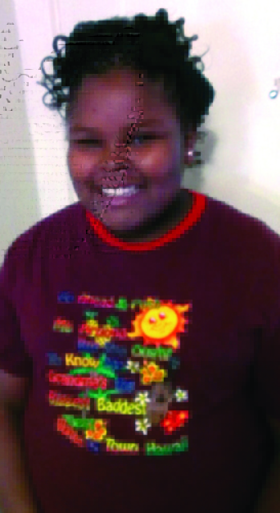 File - This undated file photo provided by the McMath family and Omari Sealey shows Jahi McMath. The family of a 13-year-old California girl who was declared brain dead after a tonsillectomy said Monday they will sue to keep her on life support. Family spokesman Omari Sealey, the uncle of Jahi McMath, disclosed the plan to seek a restraining order against the hospital where the girl is on a breathing machine. Under an order issued on Dec. 24 by a state judge, Jahi could be removed from a ventilator at Children's Hospital of Oakland at 5 p.m. PST. (AP Photo/Courtesy of McMath Family and Omari Sealey, File)
