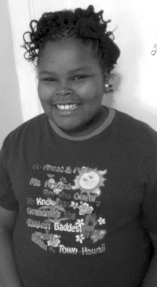 File - This undated file photo provided by the McMath family and Omari Sealey shows Jahi McMath. The family of a 13-year-old California girl who was declared brain dead after a tonsillectomy said Monday they will sue to keep her on life support. Family spokesman Omari Sealey, the uncle of Jahi McMath, disclosed the plan to seek a restraining order against the hospital where the girl is on a breathing machine. Under an order issued on Dec. 24 by a state judge, Jahi could be removed from a ventilator at Children's Hospital of Oakland at 5 p.m. PST. (AP Photo/Courtesy of McMath Family and Omari Sealey, File)