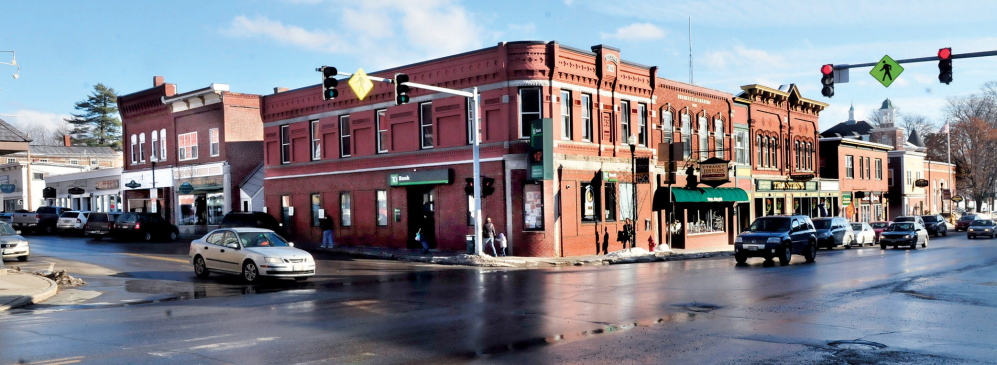 DOWNTOWN: Traffic moves through downtown Farmington this week. Town officials are hoping new initiatives, including prochures and a proposed economic development committee, will bring new businesses and residents to town.