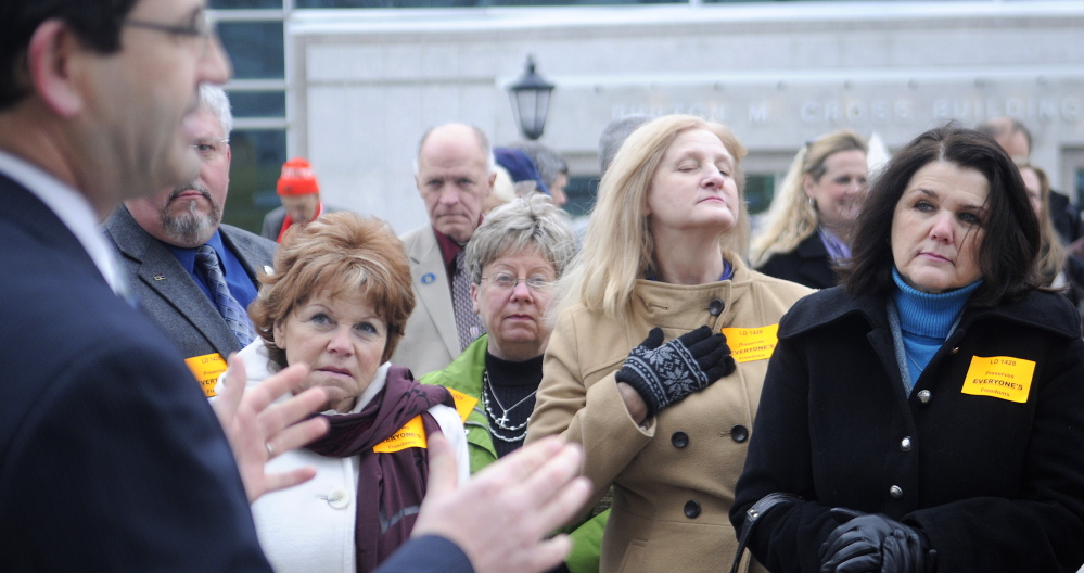 Carroll Conley Jr., executive director of the Christian Civic League of Maine, addresses supporters of L.D. 1428 on Thursday before a public hearing on the bill. He said a broad multi-faith coalition hopes to see the bill passed by the Legislature.