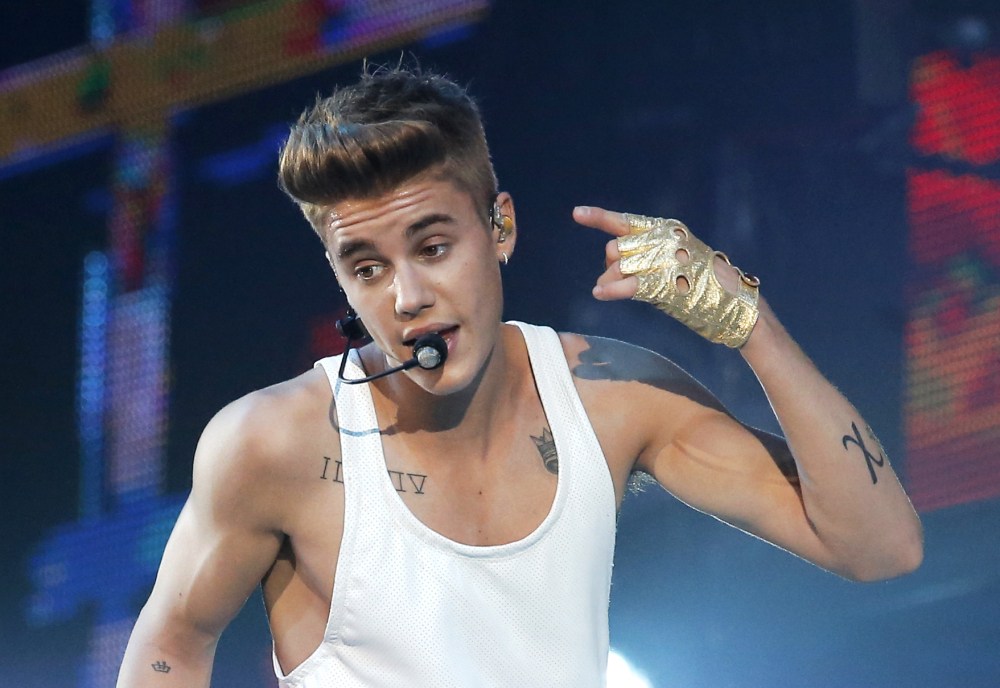 Singer Justin Bieber performs during a 2013 concert in Paris.
