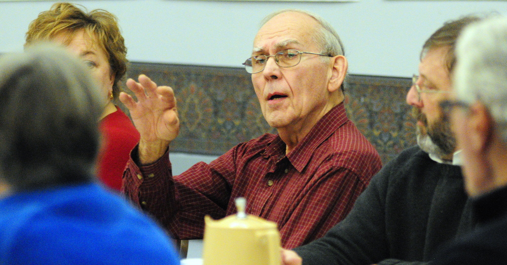 A YEAR IN FOCUS: City Councilor Cecil Munson speaks during the Augusta City Council goal-setting meeting Saturday in the Augusta Civic Center.