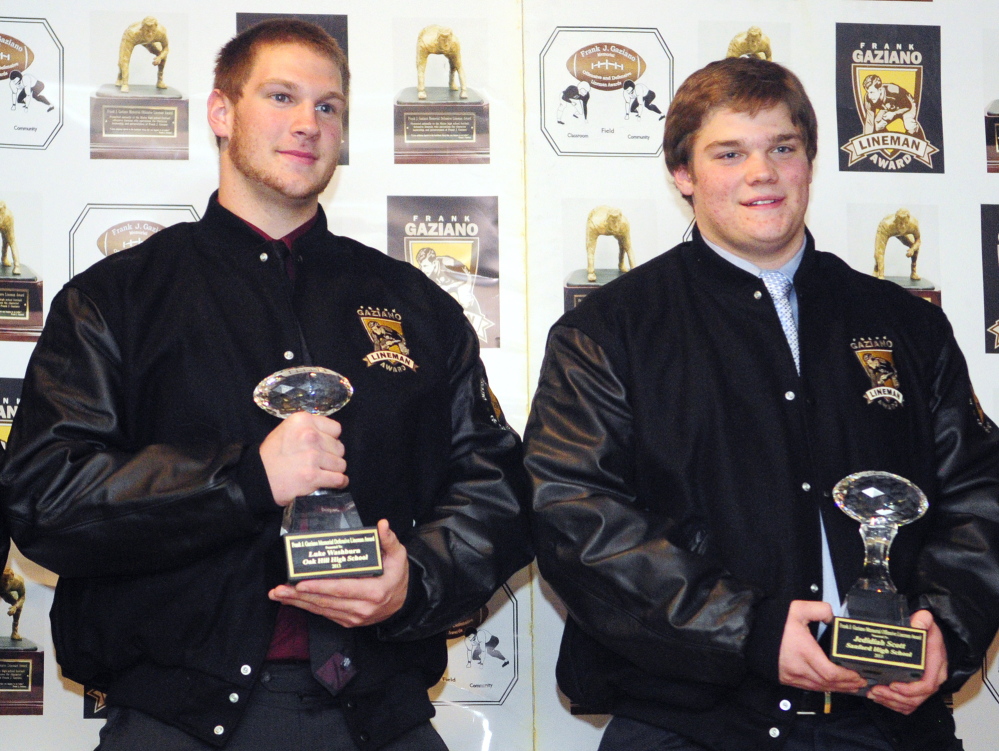 Staff photo by Joe Phelan Oak Hill defensive lineman Luke Washburn, left, and Sanford offensive lineman Jedidiah Scott won the Gaziano Lineman Awards on Saturday January 25, 2014 in the Augusta Civic Center.