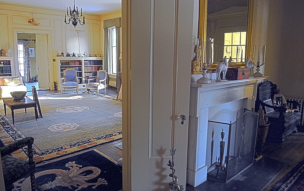 the parlor, left, and entry way of the Daniel Cony Weston House on Stone Street that’s home to the Elsie & William Viles Foundation in Augusta on Thursday January 23, 2014.