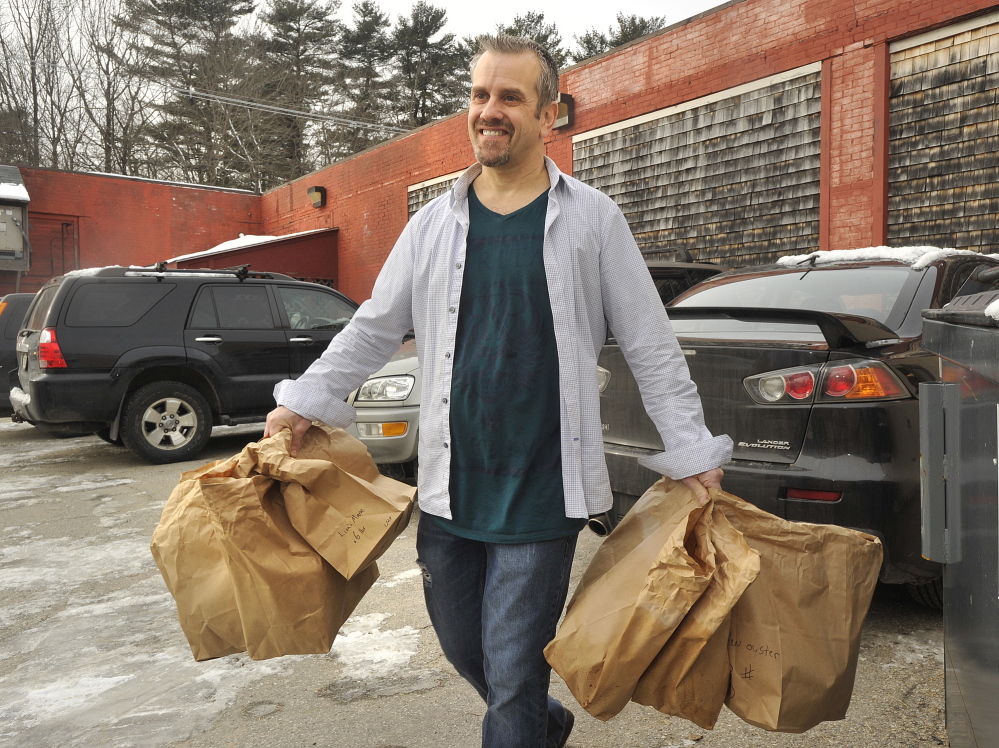 Bountiful Mushrooms Farm general manager and co-owner Scott Payson heads off to make deliveries of newly picked mushrooms to area restaurants. Tuesday, January, 21, 2014. John Ewing/staff Photographer.