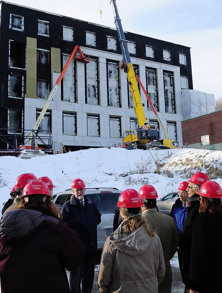 Courthouse progress: Construction work continues as members of the Legislature’s Judiciary Committee take a tour on Thursday at the new court building in Augusta.